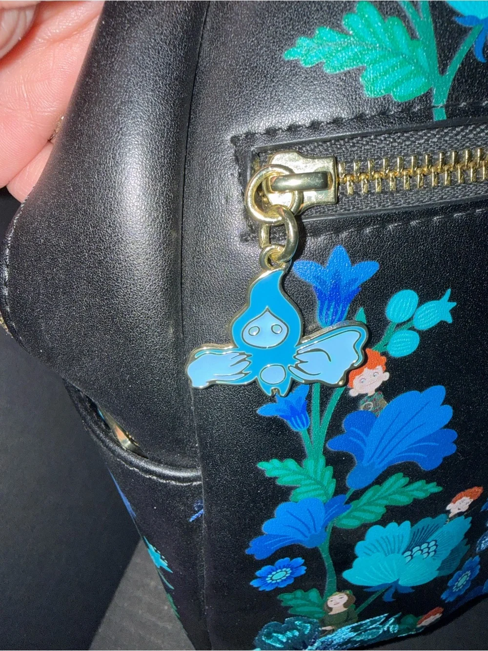 Loungefly Pixar Black Mini Backpack with Blue Floral Print